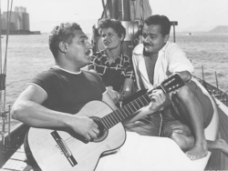 Dorival Caymmi and Carlos Guinle (with an unidentified lady on Guinle's sailboat Laffite)